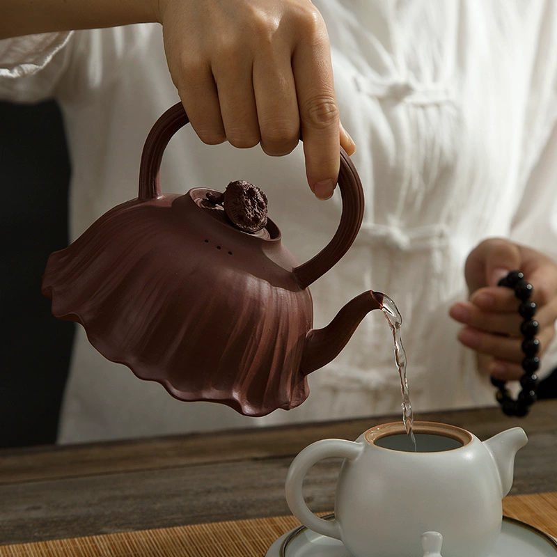 JIADAI red clay tea set arranged on a table