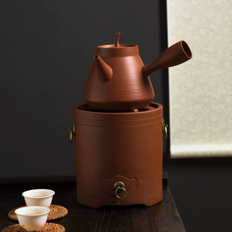 JIADAI handmade Chaozhou red clay teapot on a clay warmer with white cups